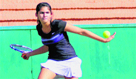 A player in action during a tennis match in the girls category at CLTA, Sector 10, in Chandigarh.