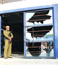 Windowpanes of the principals office smashed by a students kin angry who are angry with the authorities for the alleged sexual harassment of their ward at Delhi Public School in Rohtak on Tuesday