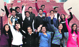 Students rejoice at their selection in the Ceasefire company in a placement drive at Lovely Professional University near Jalandhar on Tuesday. 