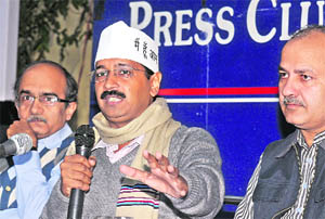 AAP leaders Arvind Kejriwal, Manish Sisodia and Prashant Bhushan at a press conference in New Delhi on Tuesday. 
