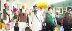Pilgrims at Amritsar railway station on Tuesday. 