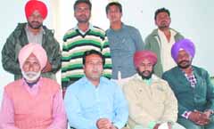 Members of the Mazdoor Mukti Morcha address a press conference in Bathinda on Wednesday. a tribune photograph