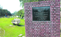 The names of Congress MP Pawan Bansal, along with the names of former Mayor Subhash Chawla and former councillor Harpreet Kaur Babla, figure on a plaque marking the inauguration of a green belt in Sector 27 in 2003