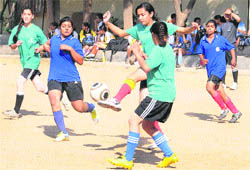 Players in action during a soccer tournament in Chandigarh on Wednesday. 