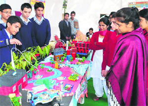 Students display a model at the state-level science exhibition at the State Institute of Education in Sector 32, Chandigarh, on Wednesday.