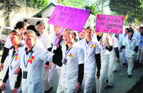 Nursing students take out a march in Kangra on Wednesday.