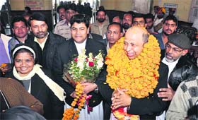Christians welcome Archbishop Dr Anil Joseph Thomas Couto at the railway station in Jalandhar on Wednesday