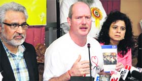 Minister of Finance in the British Columbia (BC) province in Canada Michael de Jong (centre), accompanied by former minister of British Columbia Dr Gulzar Cheema (left), addresses the media in Jalandhar on Wednesday