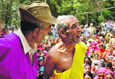 A street play being held by the Natrang theatre group in Kashmir.