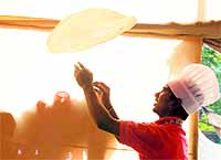  chef makes a roomali roti at Kalagram