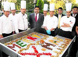 The team at Homtel ushered the Christmas spirit with the tradition of cake mixing.