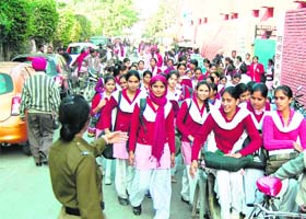 A policewomen deployed outside a school to check eve-teasing on Thursday