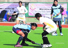 Players in action during the 10th ONGC All India Maharaja Ranjit Singh Junior Gold Hockey Cup at Guru Nanak Dev University on Thursday