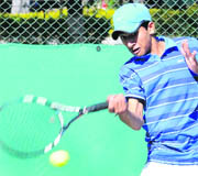 Param Pun in action during a tennis match at the CLTA, Sector 10, in Chandigarh on Thursday. 