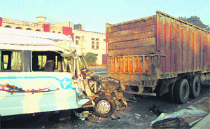 The mangled remains of the tempo-traveller which rammed into a stationary truck in Goraya on Thursday.