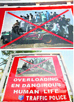 Picture in this hoarding (above) created controversy. A wrongly spelt hoarding (below) in Jammu. Tribune photo: Inderjeet Singh
