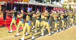 A contingent of the Home Guards and Civil Defence marches past the saluting base in Jammu on Thursday. Tribune photo: Anand Sharma 