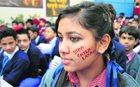 Students during a campaign against drugs and child labour in Ludhiana on Thursday. 