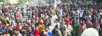 Residents of the Chheharta area protest against the Punjab Government and police in Amritsar on Friday.