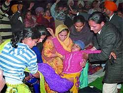 Special trainer Jasbir Kaur, who was on fast-unto-death, being taken to the Civil Hospital in Bathinda on Friday evening