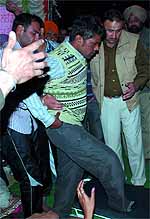 Special trainer Paramjit Singh being taken to the hospital