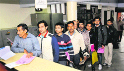 Driving licence seekers line-up at the sub-office of the Registratioin and Licensing Authority at Industrial Area, Phase I, on Friday. Tribune photo: Manoj Mahajan