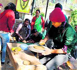 Schoolchildren participate in a workshop on pottery and bamboo art-making organised by SpicMacay