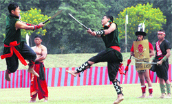 Two warriors of the Assam Regiment showcase their martial art prowess academy building, Dehradun, on Friday. Tribune photo: Vinod Pundir