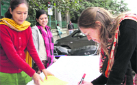 Members of the Astitva, a voluntary organisation, during a public awareness campaign on domestic violence in Dehradun on Friday. Tribune photo: Vinod Pundir 