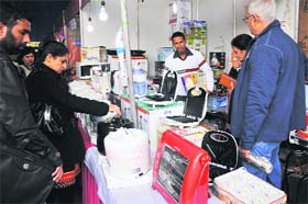Electronic products on sale at an exhibition at Kala Kendra in Jammu.