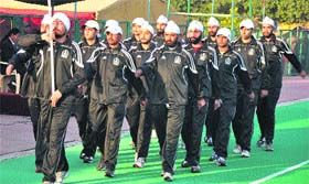 Players of the J&K Police participate in the opening ceremony at Hakhoo stadium in Jammu on Friday.