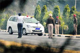 Senior officials oversee security arrangements on the PAU campus ahead of Prime Minister Manmohan Singh's visit.