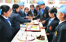 Students showcase their models during a maths fair organised at GNP School in Ludhiana on Friday.