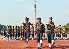 Army personnel march during the Change of Guard ceremony at the Rashtrapati Bhavan in New Delhi on Saturday