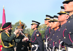 The Chief of Army Staff, Gen Bikram Singh, presents the coveted Sword of Honour to GC Sudeep Kumar. Tribune Photo: Vinod Pundir