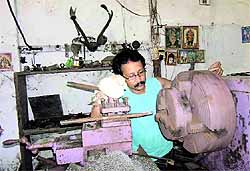 Uddhab Kumar Bharali at his workshop in Lakhimpur, Assam