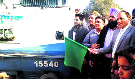 Railway officials during the arrival of Moga-New Delhi Shatabdi Express at Jagraon Railway Station.