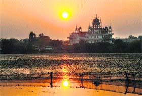 A colourful sunset at Motte village in Mohali on Sunday