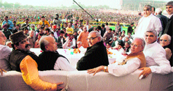 Chief Minister Bhupinder Singh Hooda, state Congress president Phool Chand Mullana, Revenue Minister Mahender Partap Singh at a massive consitituency-level rally in Faridabad on Sunday.
