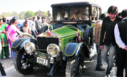 An antique car rolls into Gurgaon during a vintage car rally on Sunday. The rally was earlier flagged off by Gen Bikram Singh, Chief of the Army Staff, at Panchsheel Club in Delhi.