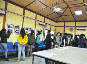 Visitors at the photo exhibition at NIFT in Kangra. 