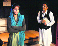 A scene from the play presented by the Natrang Studio.