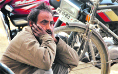 Victims father Salem in a state of shock in Ludhiana.