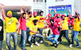 Contestants for Mr Singh International perform bhangra at an old age home in Amritsar on Monday.