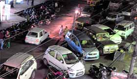 Wrong parking of vehicles leads to narrowing down of roads and traffic jams at market places in Amristar on Monday.