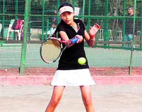 A player in action during the AITA championship in Amritsar on Monday.