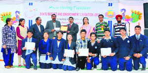 Students of Government Model Senior Secondary School, Sector 33, Chandigarh, display certificates received during a state-level science exhibition. The school won the overall best prize in the government/private senior secondary school category.