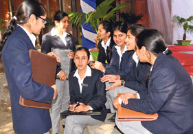 Students of University Business School wait for their turn during the campus placement at Panjab University on Monday.