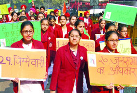 Schoolchildren take out a rally in support of save education on the World Human Rights Day, at Jantar Mantar in New Delhi on Monday. 