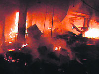 The shops which caught fire at PP market in Katra. 